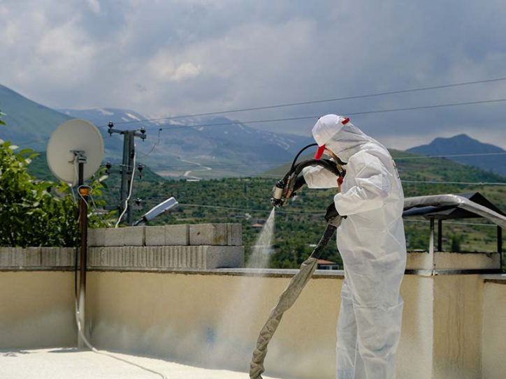 spray coating a commercial roof